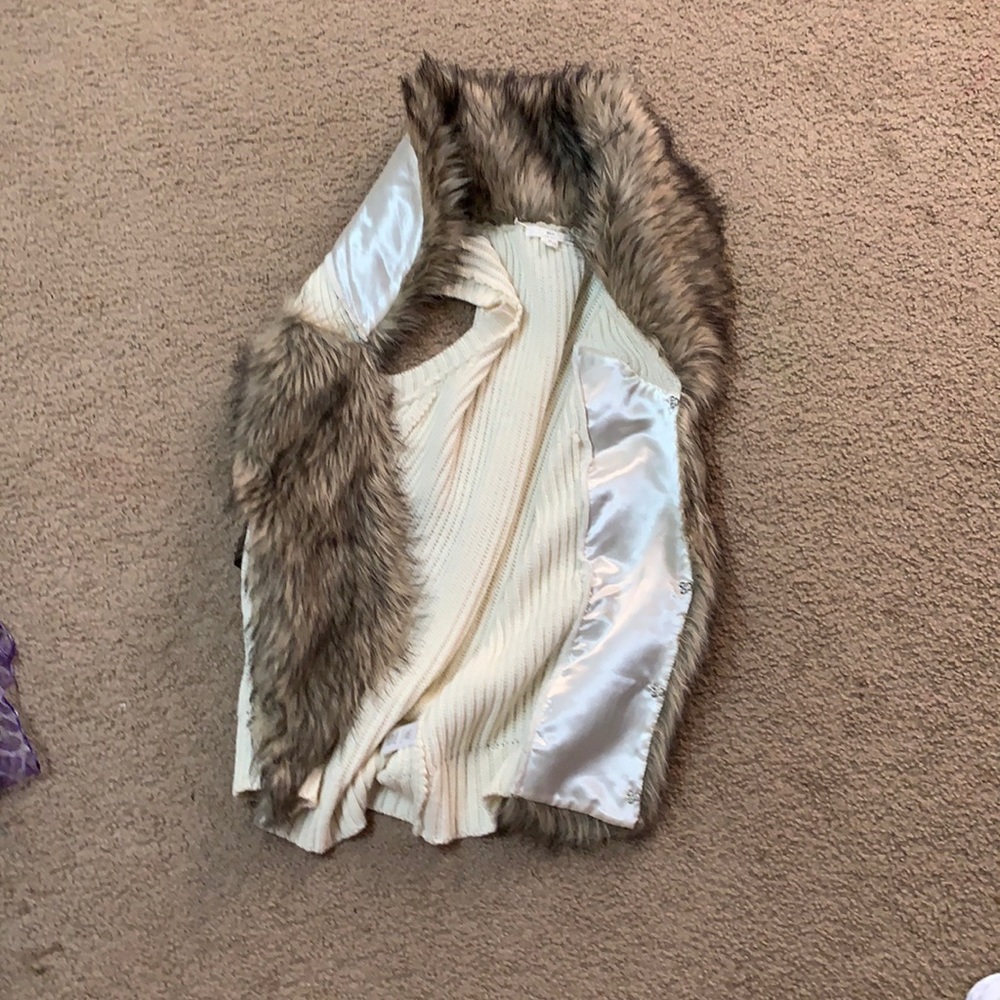 White with fur vest